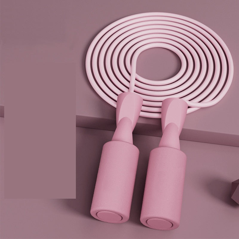 MotionHaus cordless dual-use skipping rope for home fitness, showing the compact jump rope with adjustable handles.