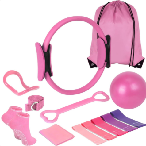MotionHaus 13-piece yoga and Pilates fitness equipment set with mats, blocks, straps, and resistance bands for exercise routines.