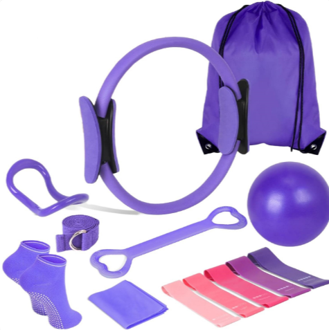 MotionHaus 13-piece yoga and Pilates fitness equipment set with mats, blocks, and resistance bands for workout practice.